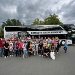 Reisegruppe mit Bus